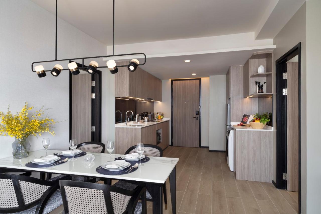 Somerset Pattaya Bagian luar foto The kitchen and dining area of a typical apartment