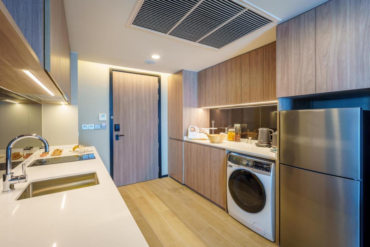 Somerset Pattaya Bagian luar foto A kitchen in a 3-bedroom unit
