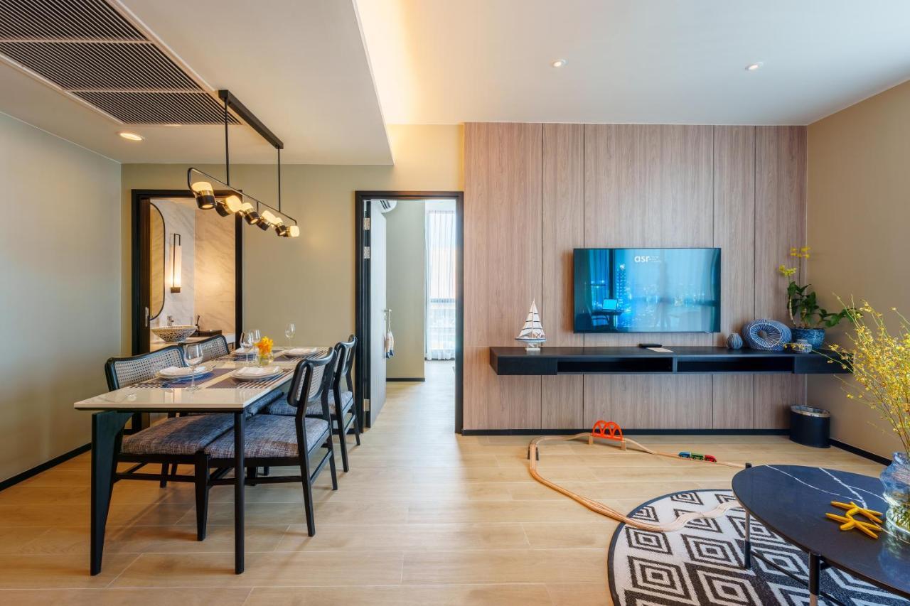 Somerset Pattaya Bagian luar foto A living room in a condominium