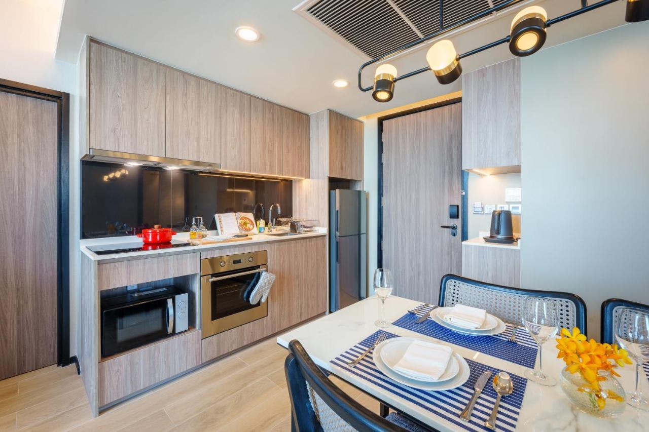 Somerset Pattaya Bagian luar foto A kitchen in a serviced apartment in Singapore