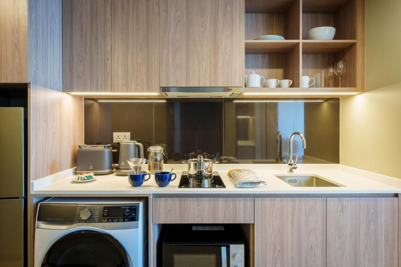Somerset Pattaya Bagian luar foto A kitchen in a serviced apartment